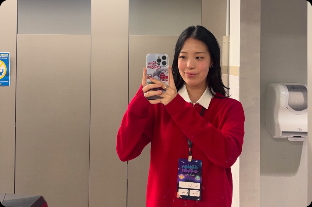 Haven taking a selfie showing her judge badge